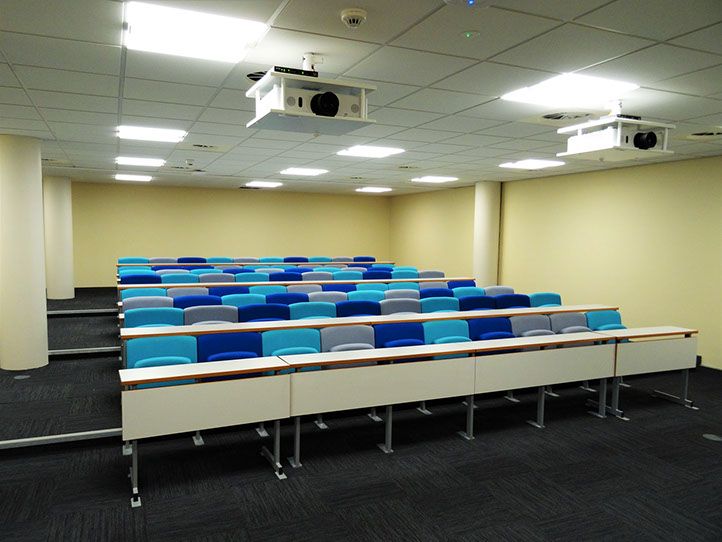 A photo of a lecture theatre with the lights on