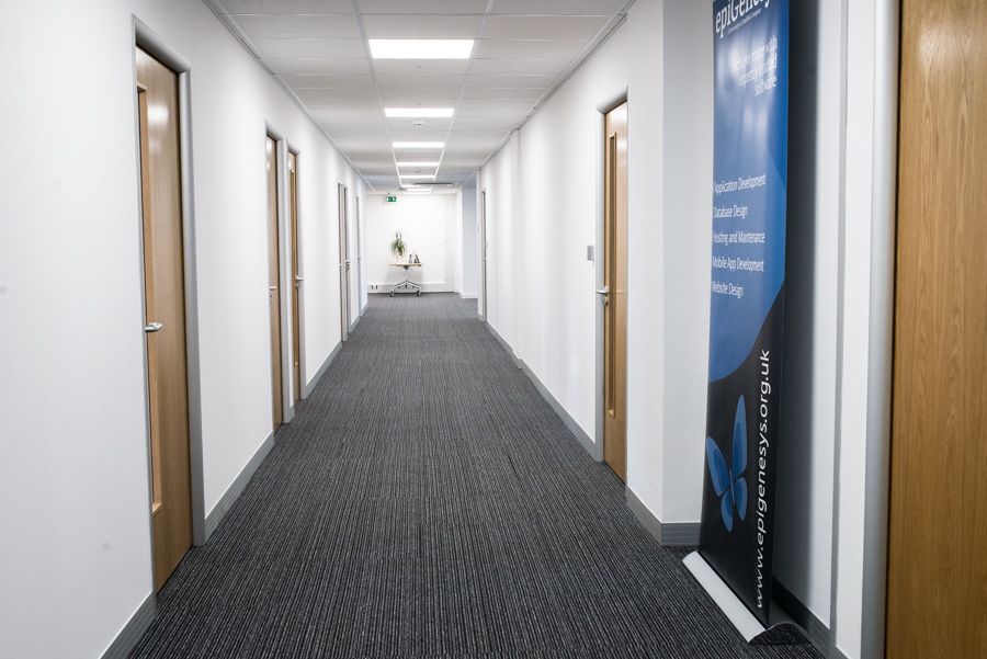A photo of a corridor inside an office